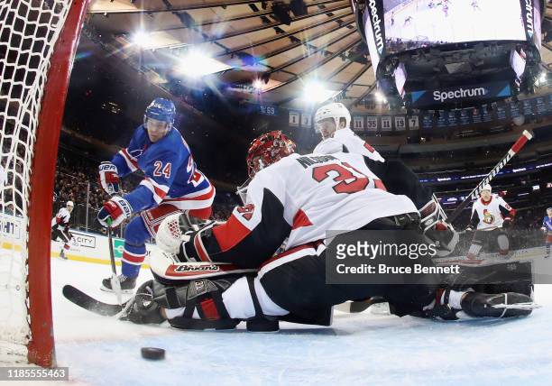 Kaapo Kakko of the New York Rangers scores a first period goal against Anders Nilsson of the Ottawa Senators at Madison Square Garden on November 04,...