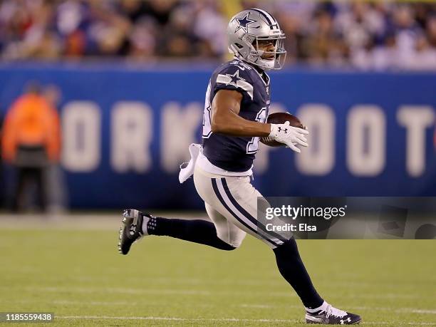 Wide receiver Randall Cobb of the Dallas Cowboys carries against the defense of the New York Giants during the game at MetLife Stadium on November...