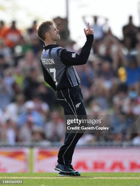 Lockie Ferguson of New Zealand celebrates dismissing Sam Curran of England during game three of the Twenty20 International series between New Zealand...