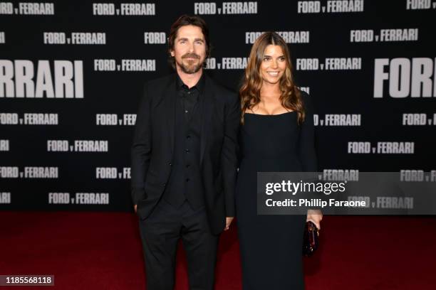 Christian Bale and Sibi Blažić attend the premiere of FOX's "Ford V Ferrari" at TCL Chinese Theatre on November 04, 2019 in Hollywood, California.