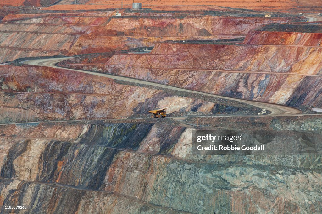 Mining Trucks working in the Super Pit Open Cut Gold Mine - Kalgoorlie, Western Australia