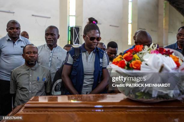 Family and colleagues of Belinda Kasongo who was part of the Ministry of Health vaccination team and was killed by armed men on November 28, 2019 in...