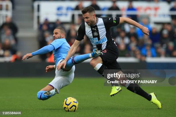 Manchester City's English defender Kyle Walker vies with Newcastle United's Welsh defender Paul Dummett during the English Premier League football...