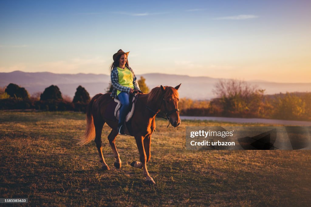 Cowgirl Riding Horse Sunset