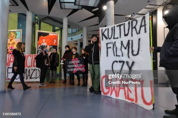 Activists hold 'Film or Rap Culture' banner during a protest in 'Solidarity Against The Rape Culture In The Film Industry' at the Polish National...