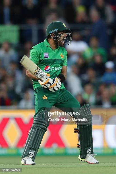 Babar Azam of Pakistan reacts after playing a shot during game two of the International Twenty20 series between Australia and Pakistan at Manuka Oval...