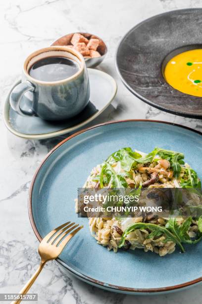 farro risotto with black truffle - pilau rice stock pictures, royalty-free photos & images