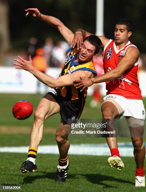 Steven Baker of the Zebras competes with Admed Saad of the Bullants during the round 15 VFL match between Sandringham and the Northern Bullants at...