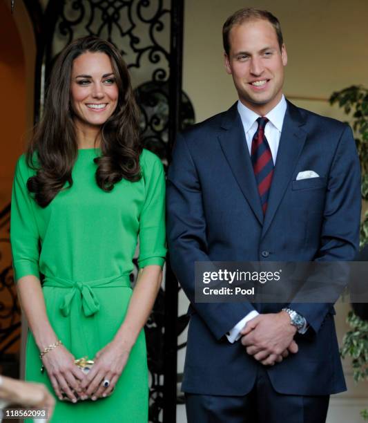 Catherine, Duchess of Cambridge and Prince William, Duke of Cambridge look on during a private reception at the British Consul-General's residence on...