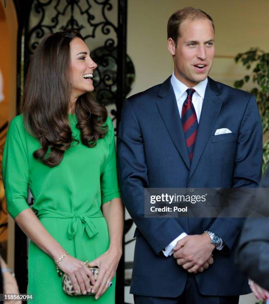 Catherine, Duchess of Cambridge and Prince William, Duke of Cambridge look on during a private reception at the British Consul-General's residence on...