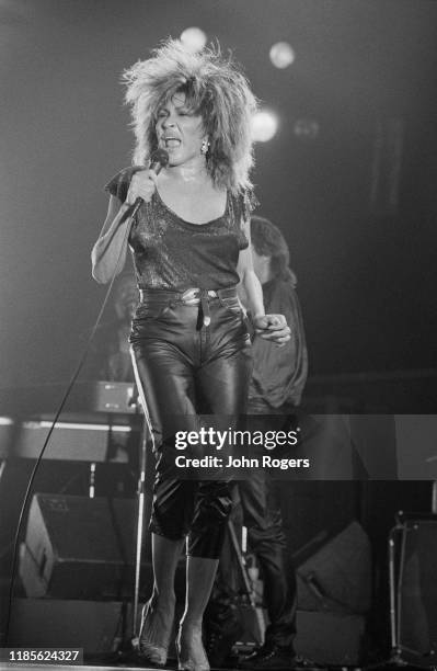 American singer, songwriter, and actress Tina Turner performs at the Brighton Centre, Brighton, UK, 11th March 1985.