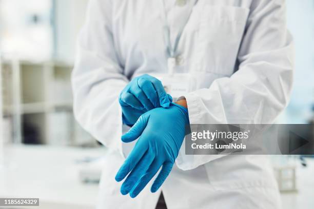 time to dig in to another investigation - surgical glove stock pictures, royalty-free photos & images