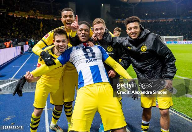 Raphael Guerreiro, Dan-Axel Zagadou, Manuel Akanji, an Thorgan Hazard and Jadon Sancho of Borussia Dortmund celebrates after winning the Bundesliga...