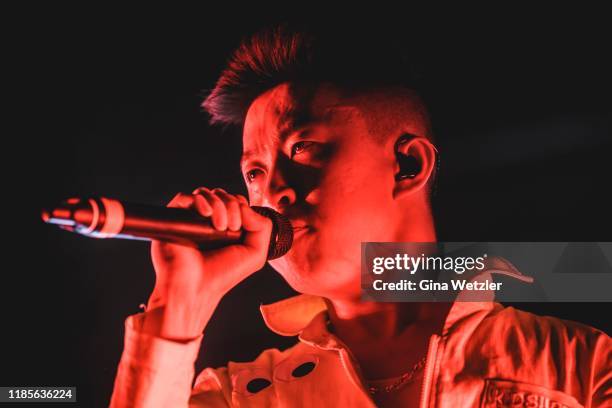 Indonesian rapper Rich Brian performs live on stage during a concert at Huxleys Neue Welt on November 30, 2019 in Berlin, Germany.