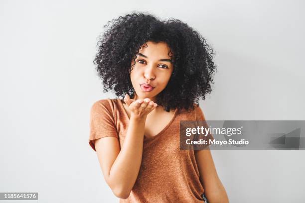 you deserve the good that's coming your way - blowing a kiss stock pictures, royalty-free photos & images