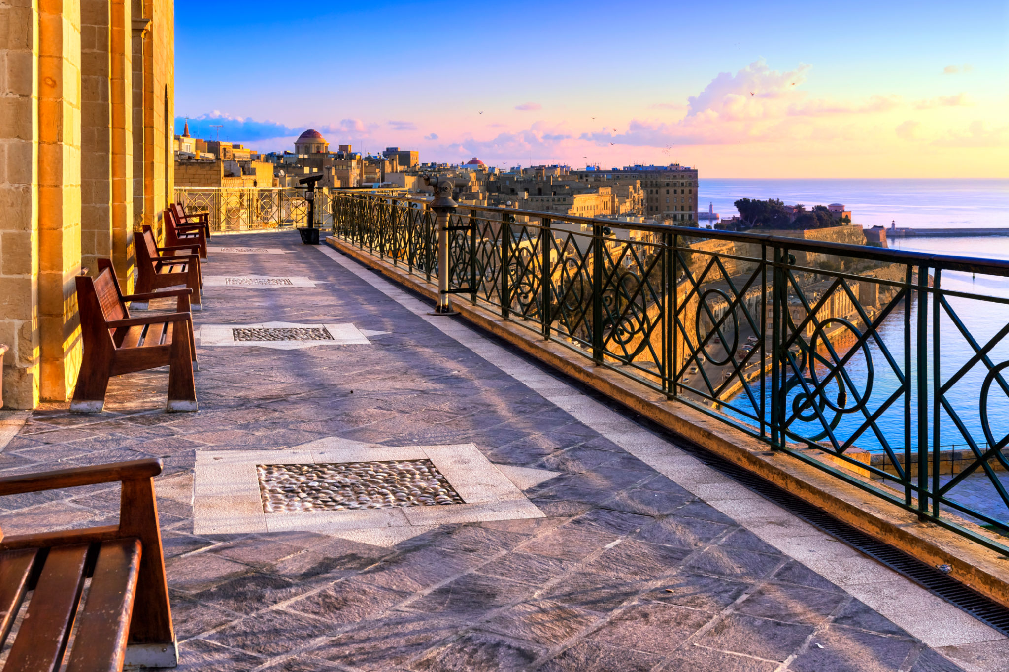Morning view from the Valetta's Upper Barrakka Gardens terrace to the Grand Harbour, Malta Morning view from the Valetta's Upper Barrakka Gardens terrace to the Grand Harbour, Malta