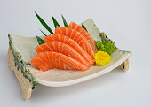Sliced raw Salmon sashimi on plate