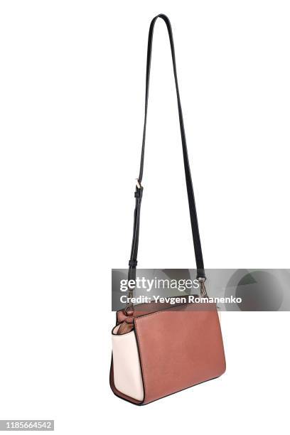 brown leather women's purse on white background - crossbody bag stock pictures, royalty-free photos & images