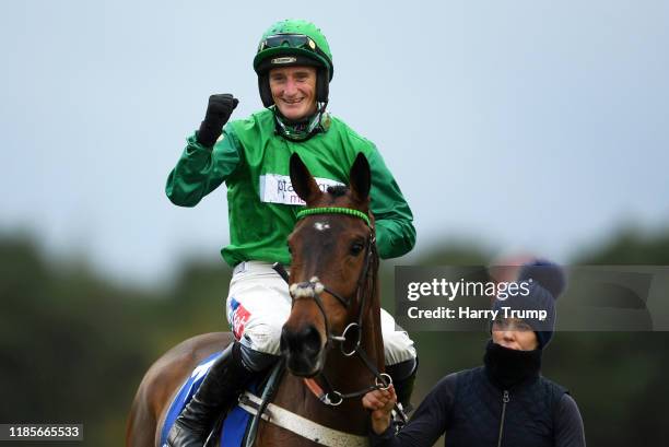 Daryl Jacob celebrates on board Janika after winning the Coral Haldon Gold Cup at Exeter Racecourse on November 05, 2019 in Exeter, England.