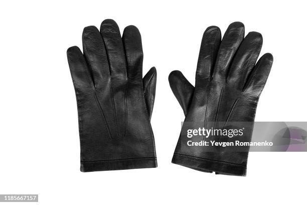 pair of black leather gloves isolated on white background - classic leather photos et images de collection