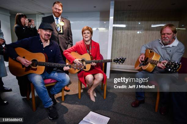 First Minister Nicola Sturgeon plays a guitar as she visits Dalkeith Community Hub with Owen Thompson, SNP election candidate for Midlothian on...