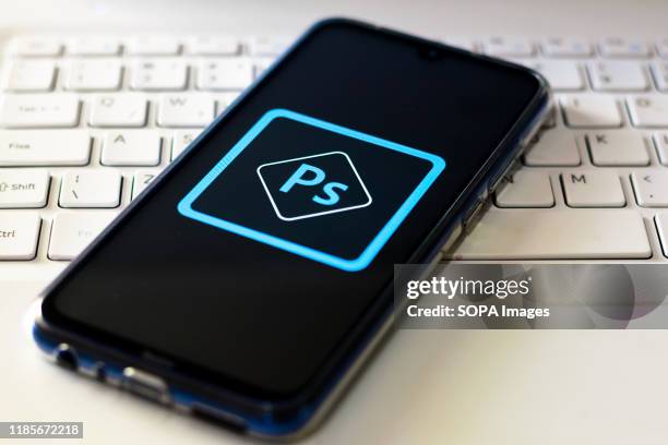 In this photo illustration the Adobe Photoshop logo is displayed on a smartphone.