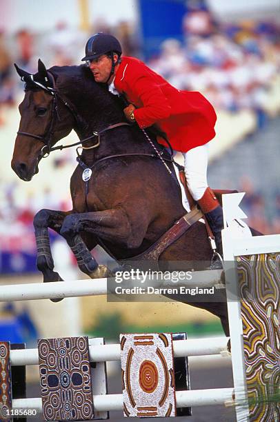 Ian Millar of Canada in action on Dorincord during the Team Show Jumping at the Sydney International Equestrian Centre on day 13 of the Sydney 2000...