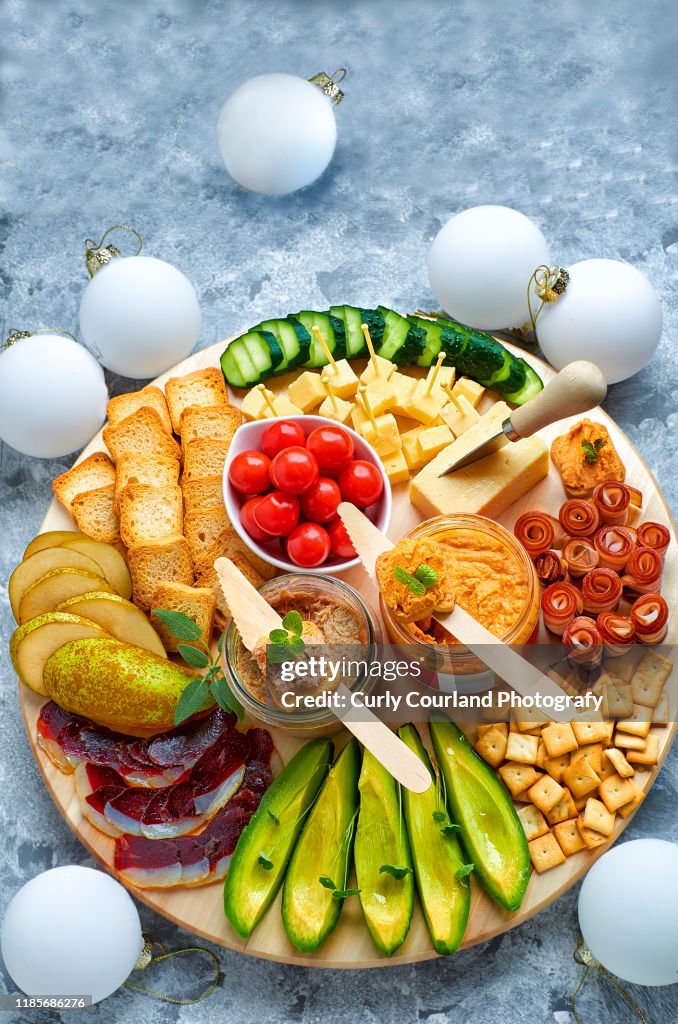 Cheese And Charcuterie Board With Cheddar Cheese Avocado Bacon