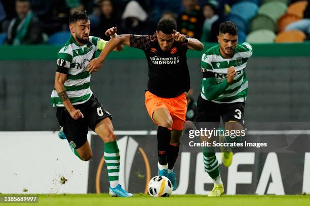 Bruno Fernandes of Sporting Clube de Portugal, Donyell Malen of PSV, Tiago Ilori of Sporting Clube de Portugal during the UEFA Europa League match...