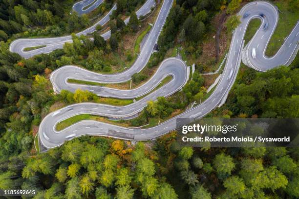 aerial view maloja pass winding road, engadin, switzerland - aerial mountain pass imagens e fotografias de stock