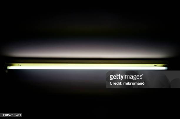 glowing fluorescent, strip light, glow tube - fluorescent stock-fotos und bilder