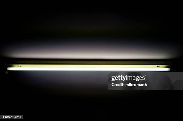 glowing fluorescent, strip light, glow tube - fluorescent fotografías e imágenes de stock