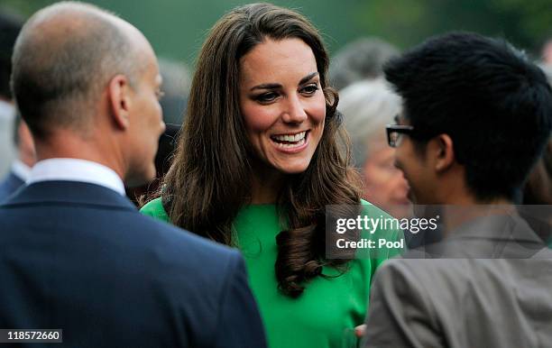 Catherine, Duchess of Cambridge mingles with guests during a private reception at the British Consul-General's residence on July 8, 2011 in Los...