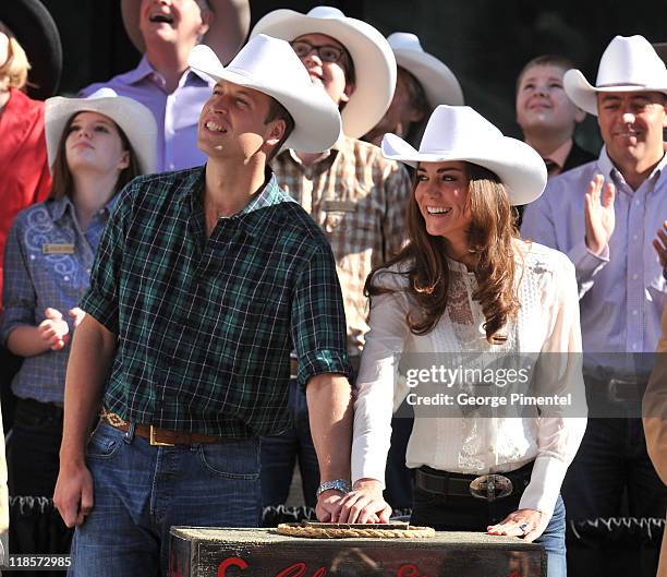 Prince William, Duke of Cambridge and Catherine, Duchess of Cambridge attend the Calgary Stampede Parade on day 9 of the Royal couple's tour of North...