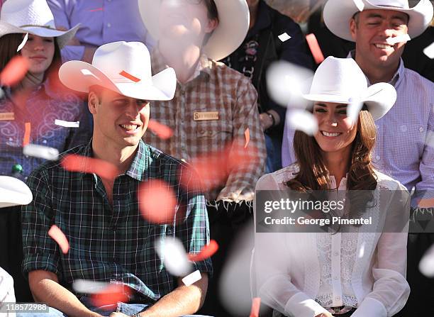 Prince William, Duke of Cambridge and Catherine, Duchess of Cambridge attend the Calgary Stampede Parade on day 9 of the Royal couple's tour of North...