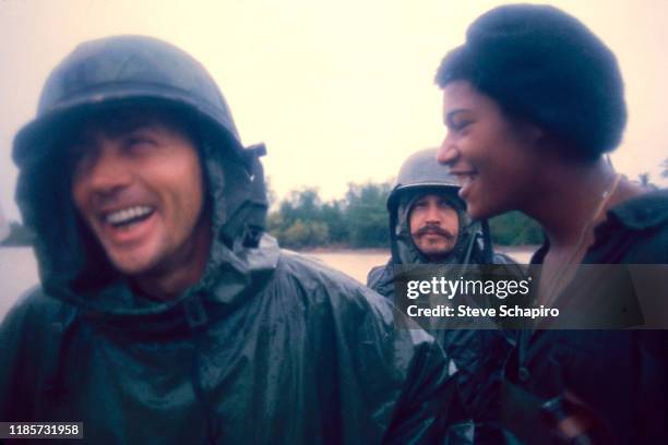 View of, from left, American actors Martin Sheen, Frederic Forrest , and Laurence Fishburne on the set of their film, 'Apocalypse Now' , Philippines,...