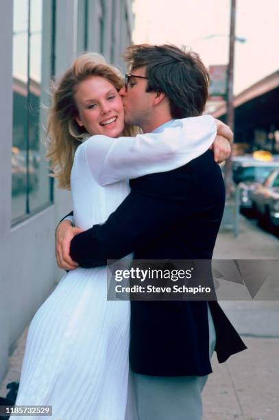 Canadian actress Dorothy Stratten and American actor John Ritter embrace on the set of the film 'They All Laughed' , New York, New York, 1980.