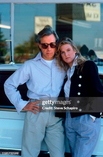 American film director Peter Bogdanovich and Canadian teenager Louise Hoogstraten talk together, Los Angeles, California, 1983. The couple married...