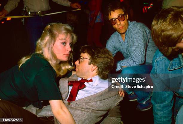View of, from left, Canadian actress Dorothy Stratten , American actor John Ritter , and film director Peter Bogdanovich, on the set of their film...