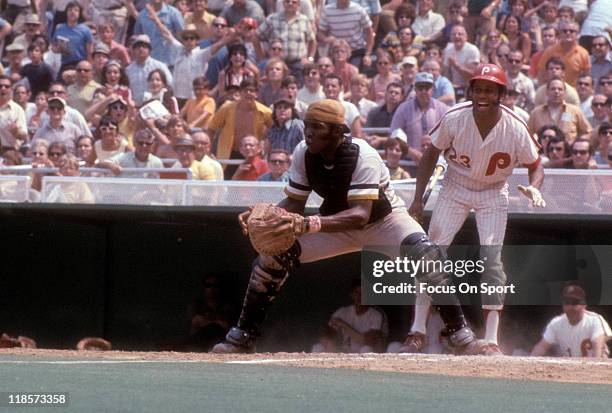 Catcher Manny Sanguillen of the Pittsburgh Pirates in action against the Philadelphia Phillies during a Major League Baseball game circa 1972 at...