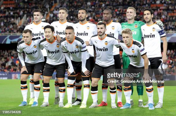 Players of Valencia pose for a team photo prior to the UEFA Champions League group H match between Valencia CF and Lille OSC at Estadio Mestalla on...