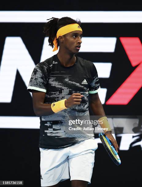 Mikael Ymer of Sweden celebrates in his group stage match against Ugo Humbert of France during Day One of the Next Gen ATP Finals at Allianz Cloud on...