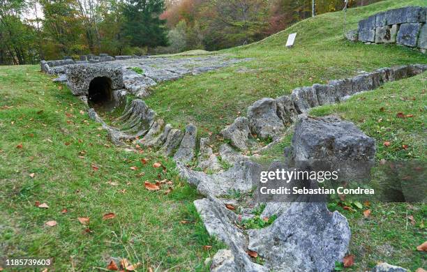 water line in the dacian fortress of sarmizegetusa regia, romania, europe. - sarmizegetusa regia stock pictures, royalty-free photos & images