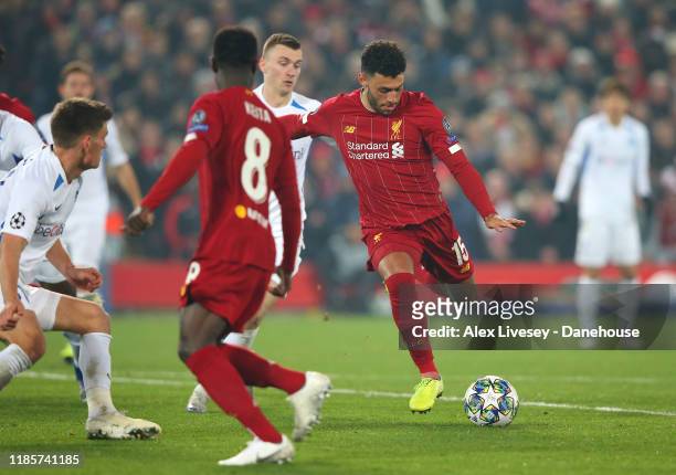 Alex Oxlade-Chamberlain of Liverpool scores their second goal during the UEFA Champions League group E match between Liverpool FC and KRC Genk at...