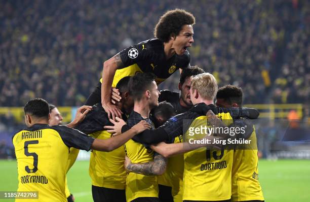 Axel Witsel of Borussia Dortmund celebrates his teams second goal scored by Julian Brandt with his teammates during the UEFA Champions League group F...