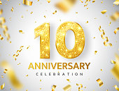 10th Anniversary celebration. Gold numbers with glitter gold confetti, serpentine. Festive background. Decoration for party event. Tenth year jubilee celebration. Vector illustration