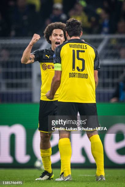 Axel Witsel and Mats Hummels of Dortmund celebrate their win of the UEFA Champions League group F match between Borussia Dortmund and Inter at Signal...