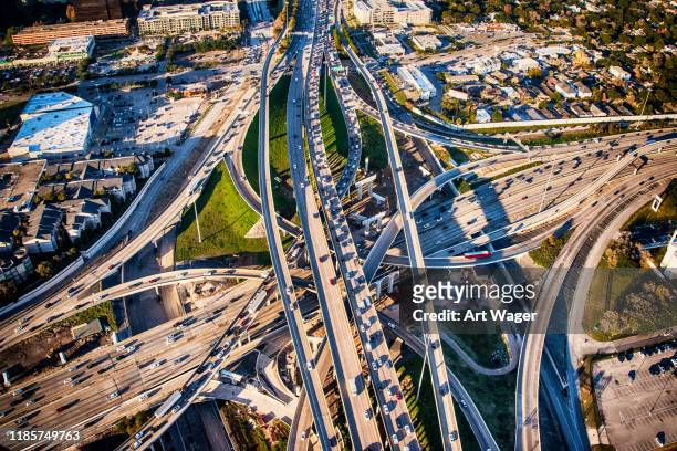 houston freeway interchange - houston texas stock-fotos und bilder