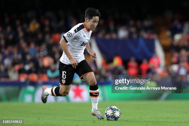 Lee Kang-In of Valencia runs with the ball during the UEFA Champions League group H match between Valencia CF and Lille OSC at Estadio Mestalla on...