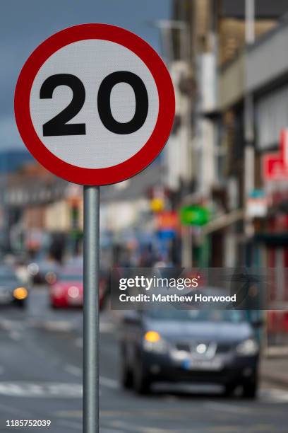 20mph speed limit sign on a residential street on October 12, 2019 in Cardiff, United Kingdom.